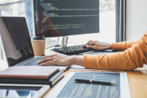 Young,Professional,Programmer,Working,At,Developing,Programming,And,Website,Working