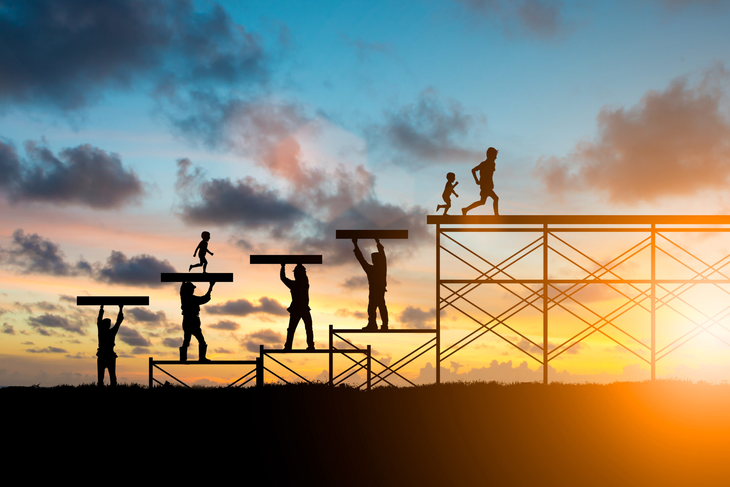 Silhouette,Adults,Helped,Build,The,Foundation,For,A,Child,To